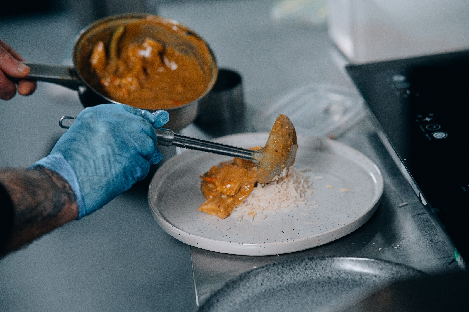 Chef plating a NutriKing meal